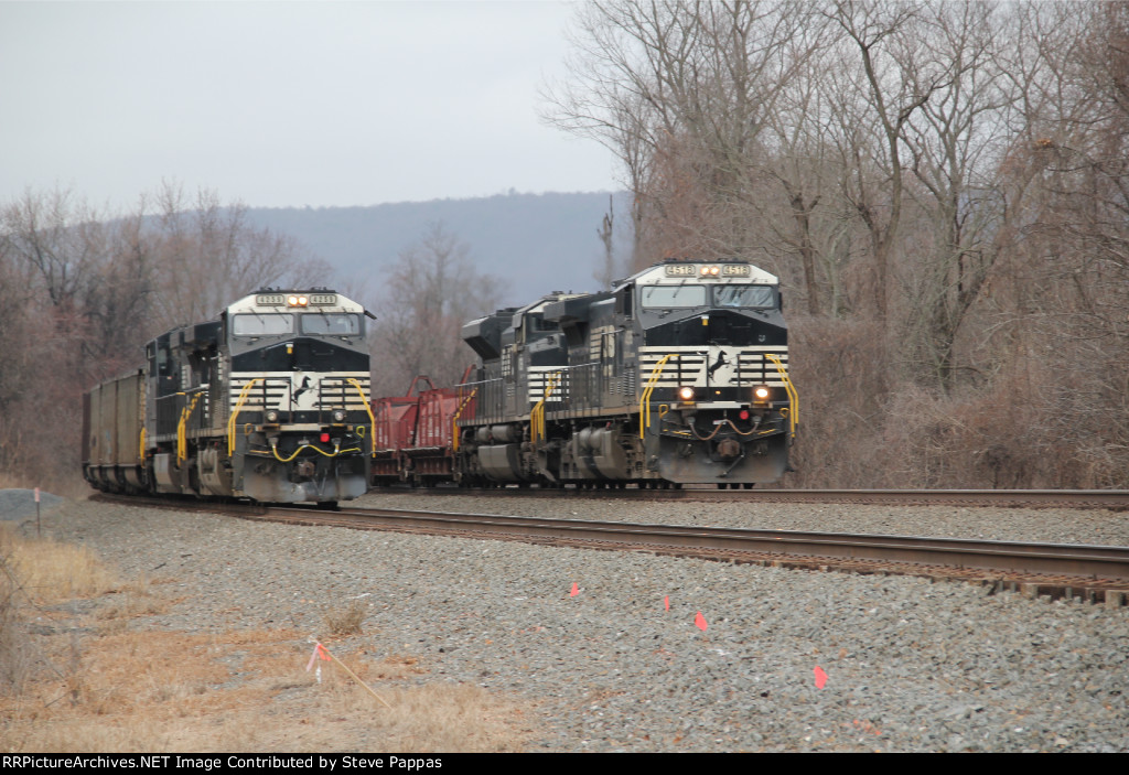 NS 4518 leads train 38G past a coal train on the siding